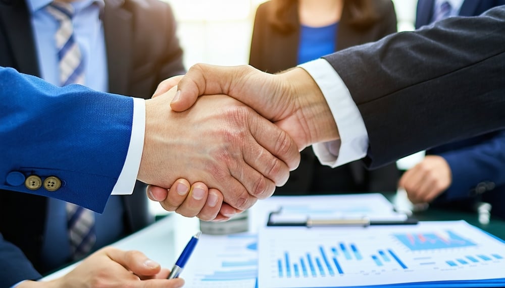 Business handshake symbolizing trust and partnership in insurance services Business handshake symbolizing trust and partnership in insurance services